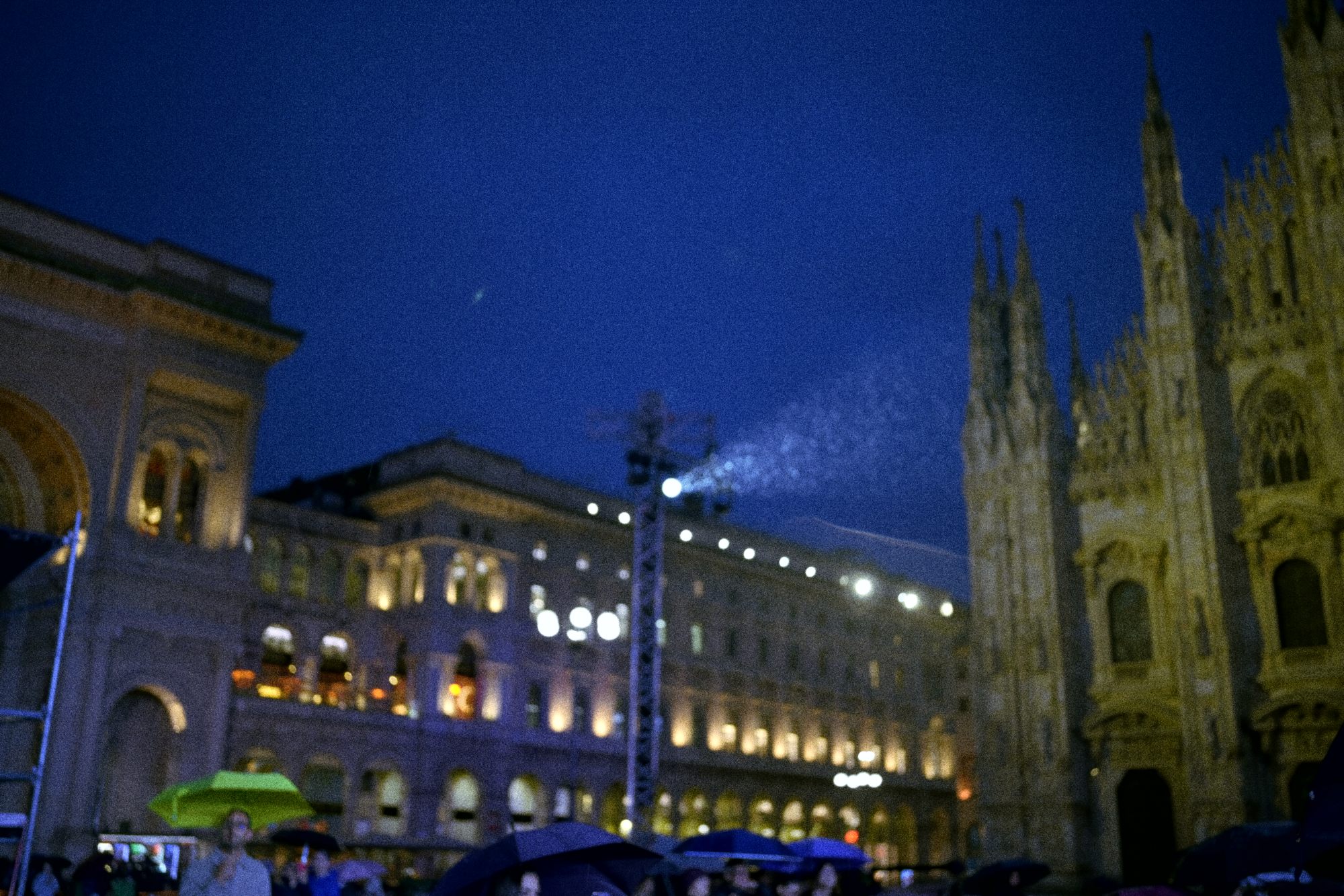 The Duomo at night, the piazza glowing.